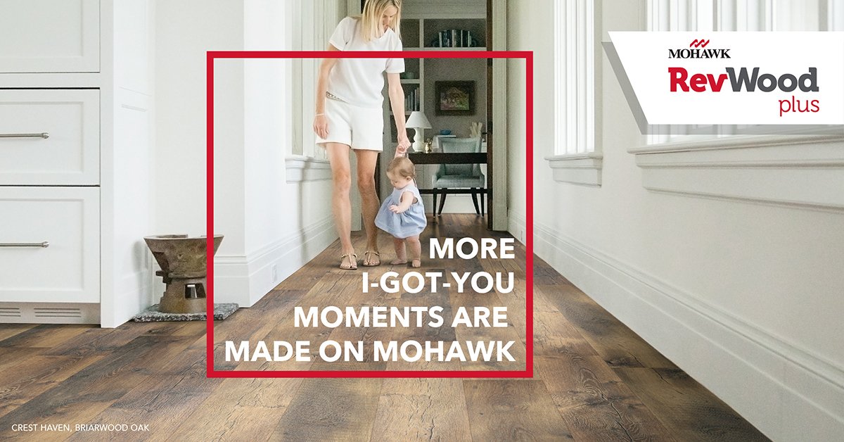 Woman and child walking on RevWood flooring